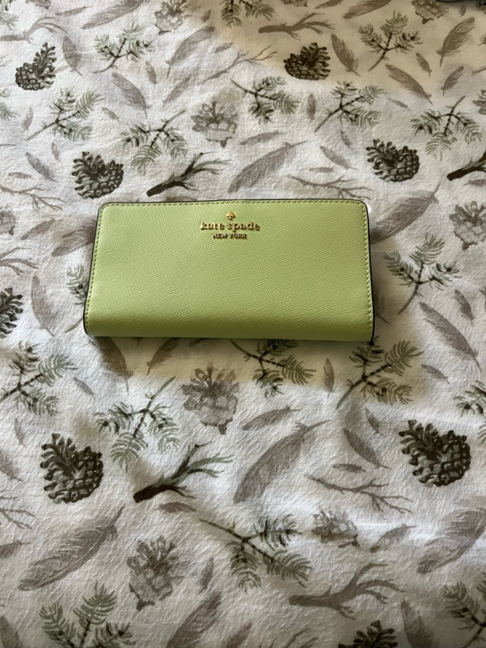 kate spade Light Green Saffiano Zip Around Wallet with Gold Logo